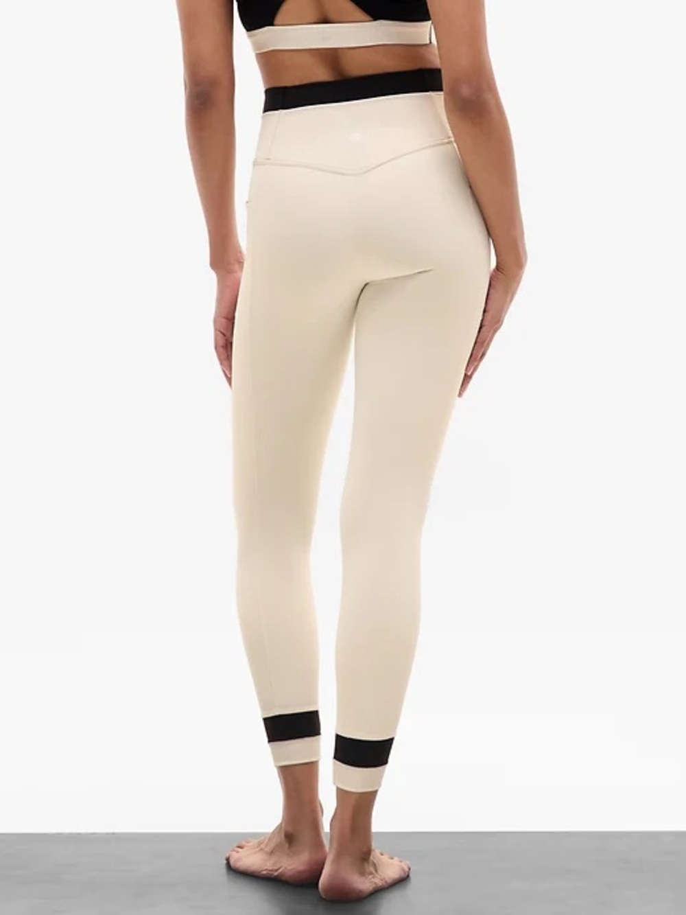 Athleta Cream High-Rise Leggings with Black Waist and Ankle Bands